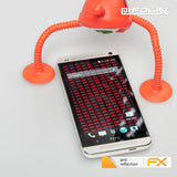 atFoliX Panzerfolie kompatibel mit HTC One, entspiegelnde und stoßdämpfende FX Schutzfolie (3X)